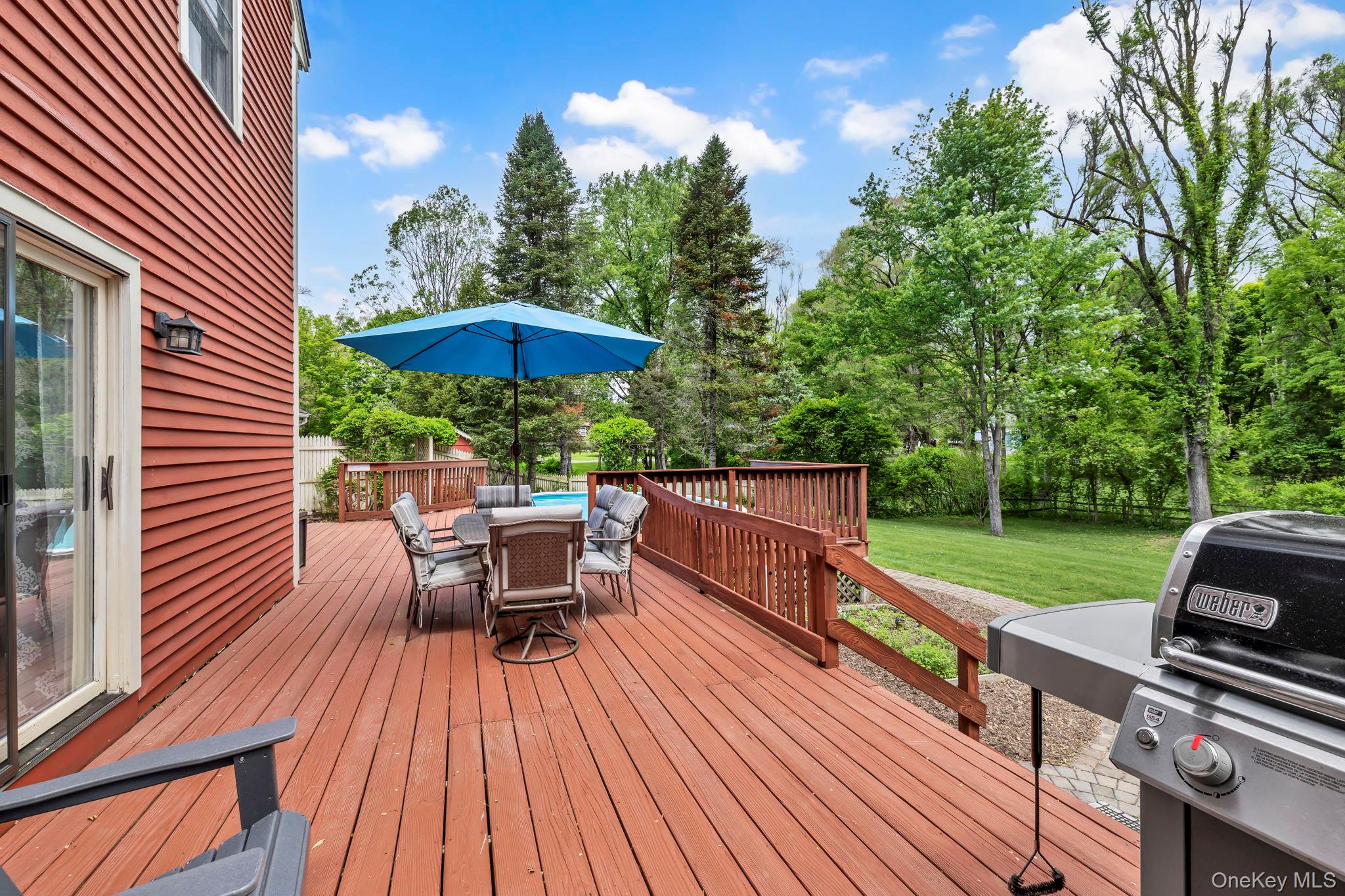 74 Vincent Lane Stone Ridge, NY 12484 - Photo 43 of 49 a view of a roof deck with chair and wooden floor