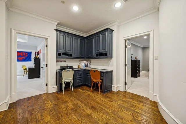 a living room with furniture a rug and a large window