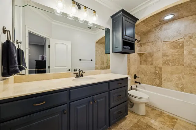 a view of a porch with furniture and fireplace