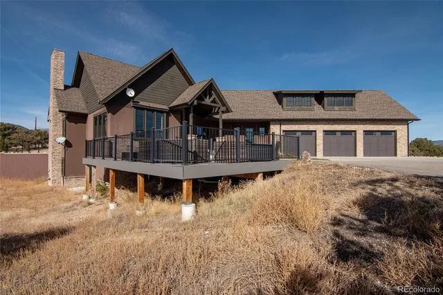 a view of a house with roof deck