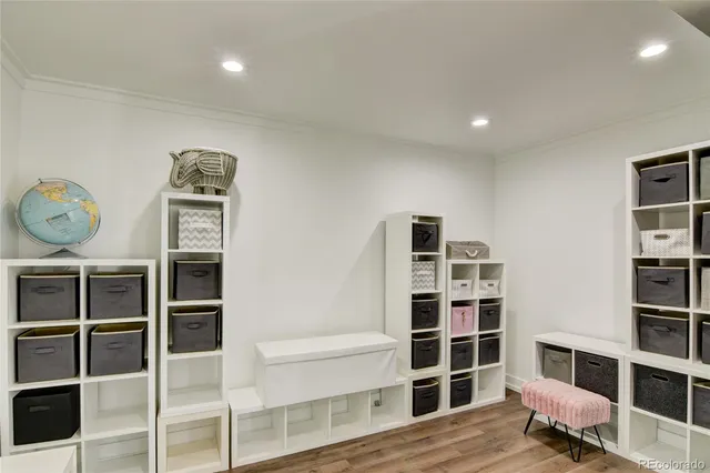 a view of a livingroom with furniture and wooden floor