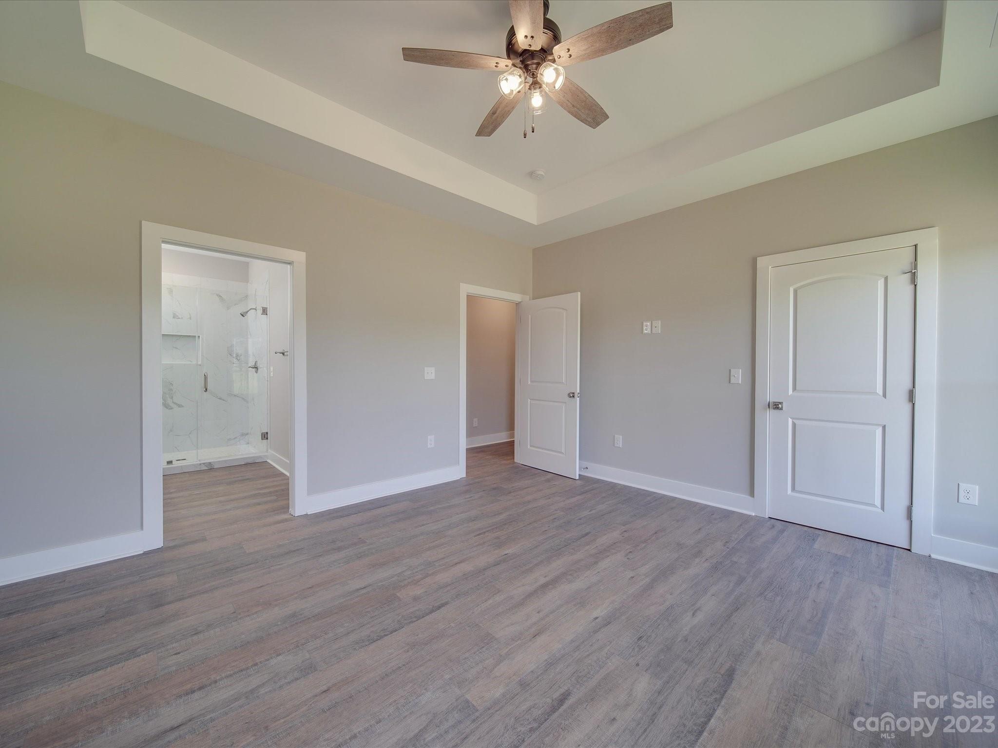 1321 Stack Road Monroe, NC 28112 - Photo 18 of 33 a view of an empty room with wooden floor