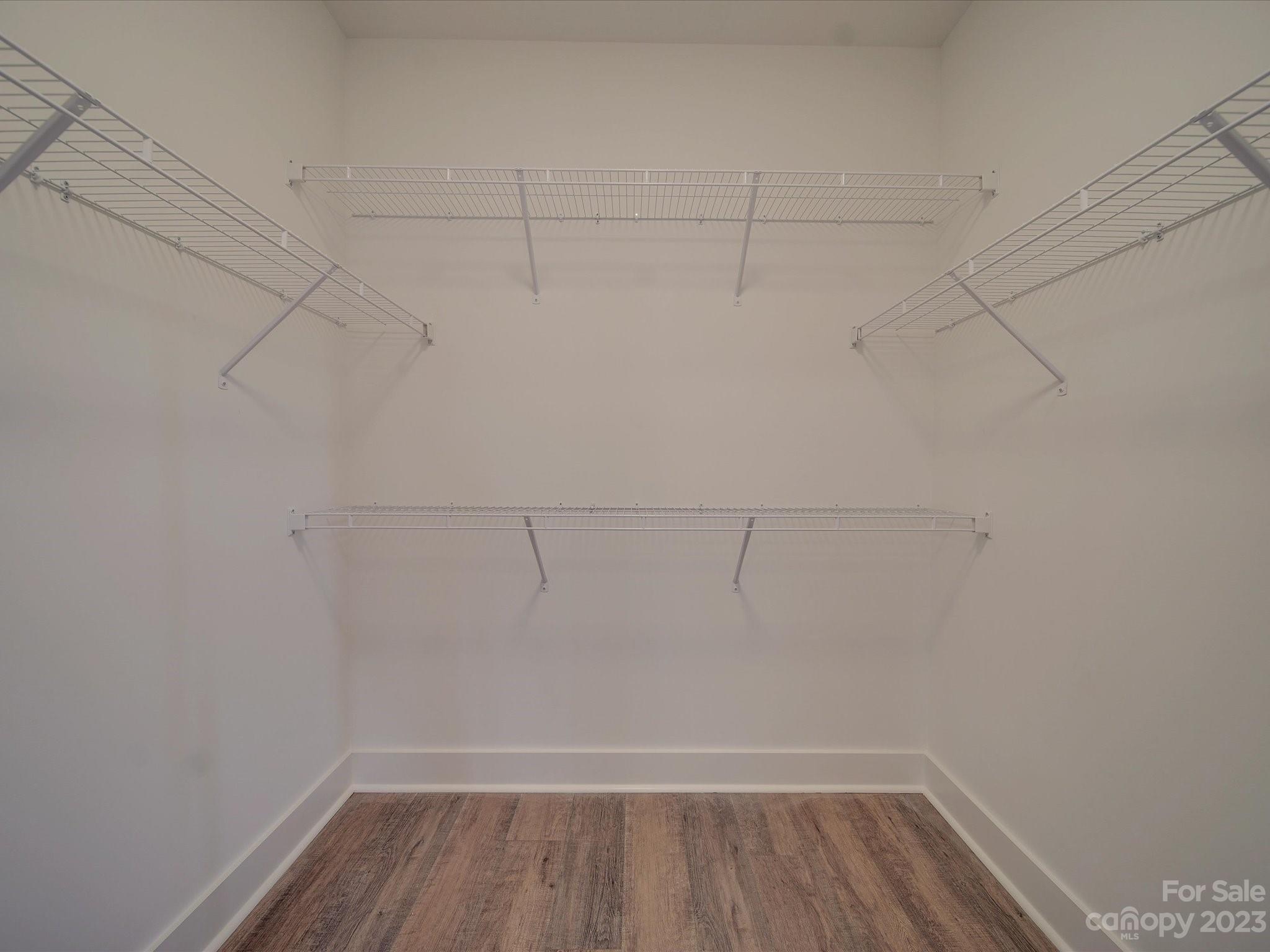 1321 Stack Road Monroe, NC 28112 - Photo 21 of 33 a view of a room with racks on the wall