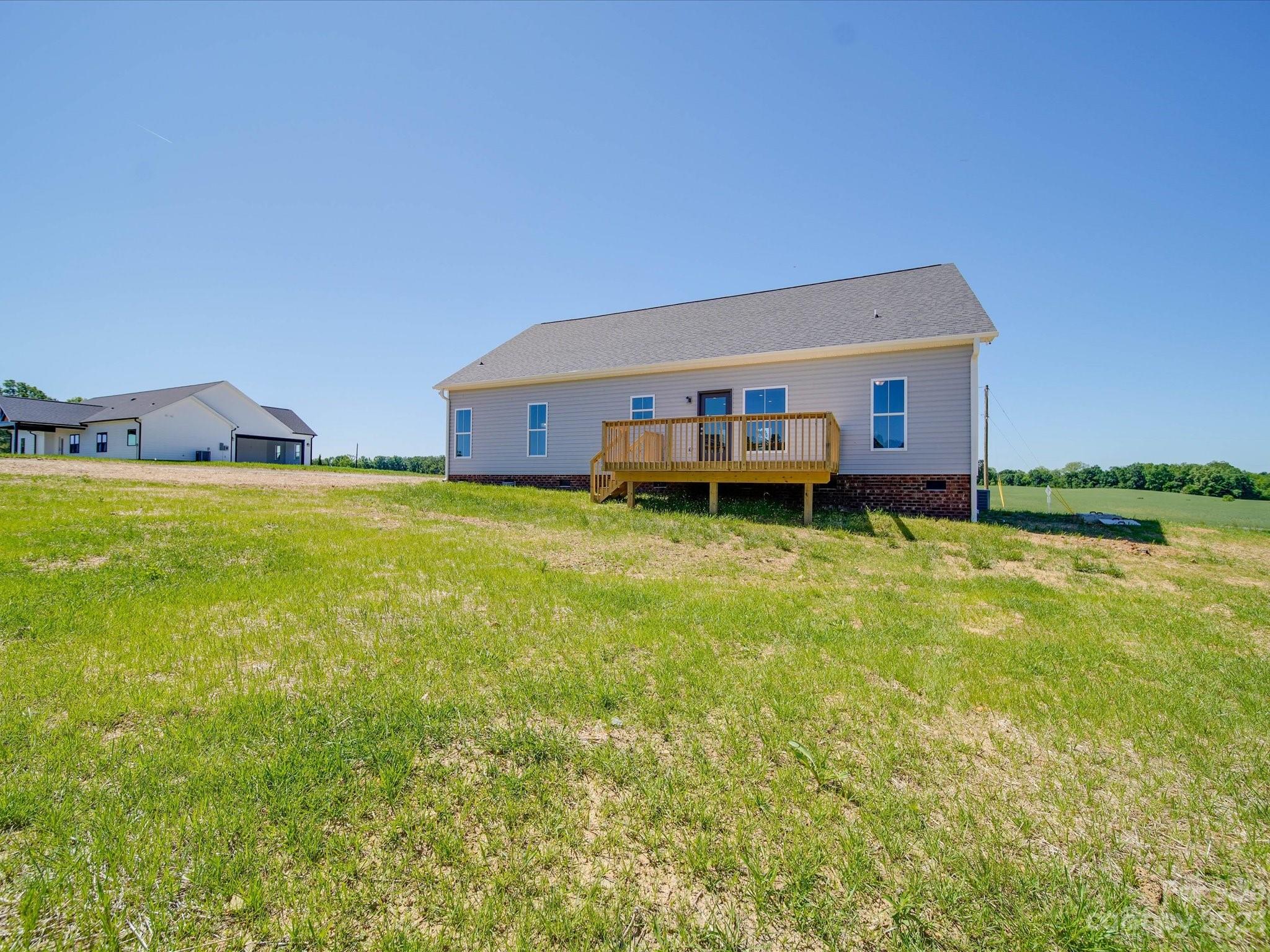 1321 Stack Road Monroe, NC 28112 - Photo 31 of 33 a view of a house with a big yard and a large tree