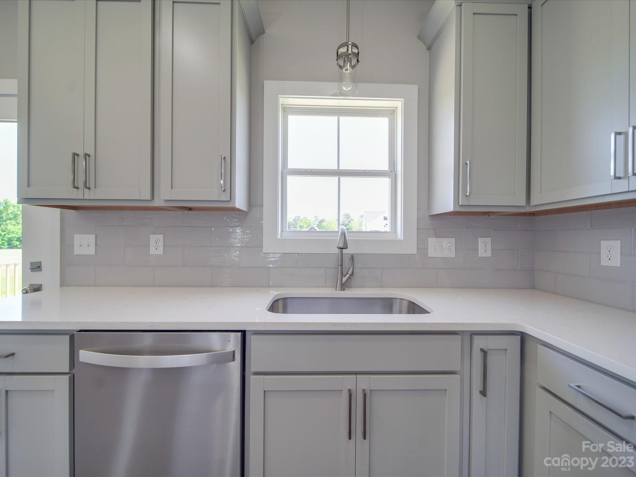 1321 Stack Road Monroe, NC 28112 - Photo 10 of 33 a kitchen with a sink cabinets and window