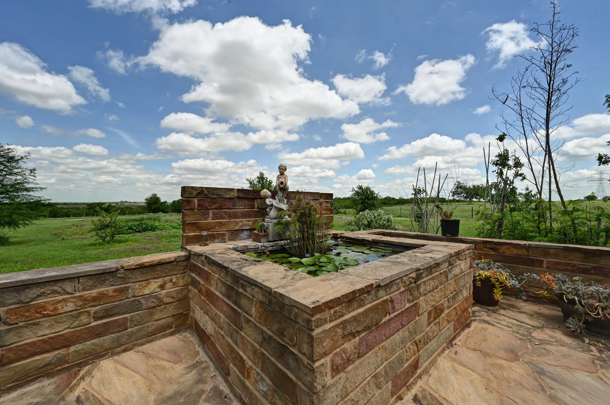 410 Simmons Family Farm Road Lockhart, TX 78644 - Photo 26 of 40 a view of a terrace