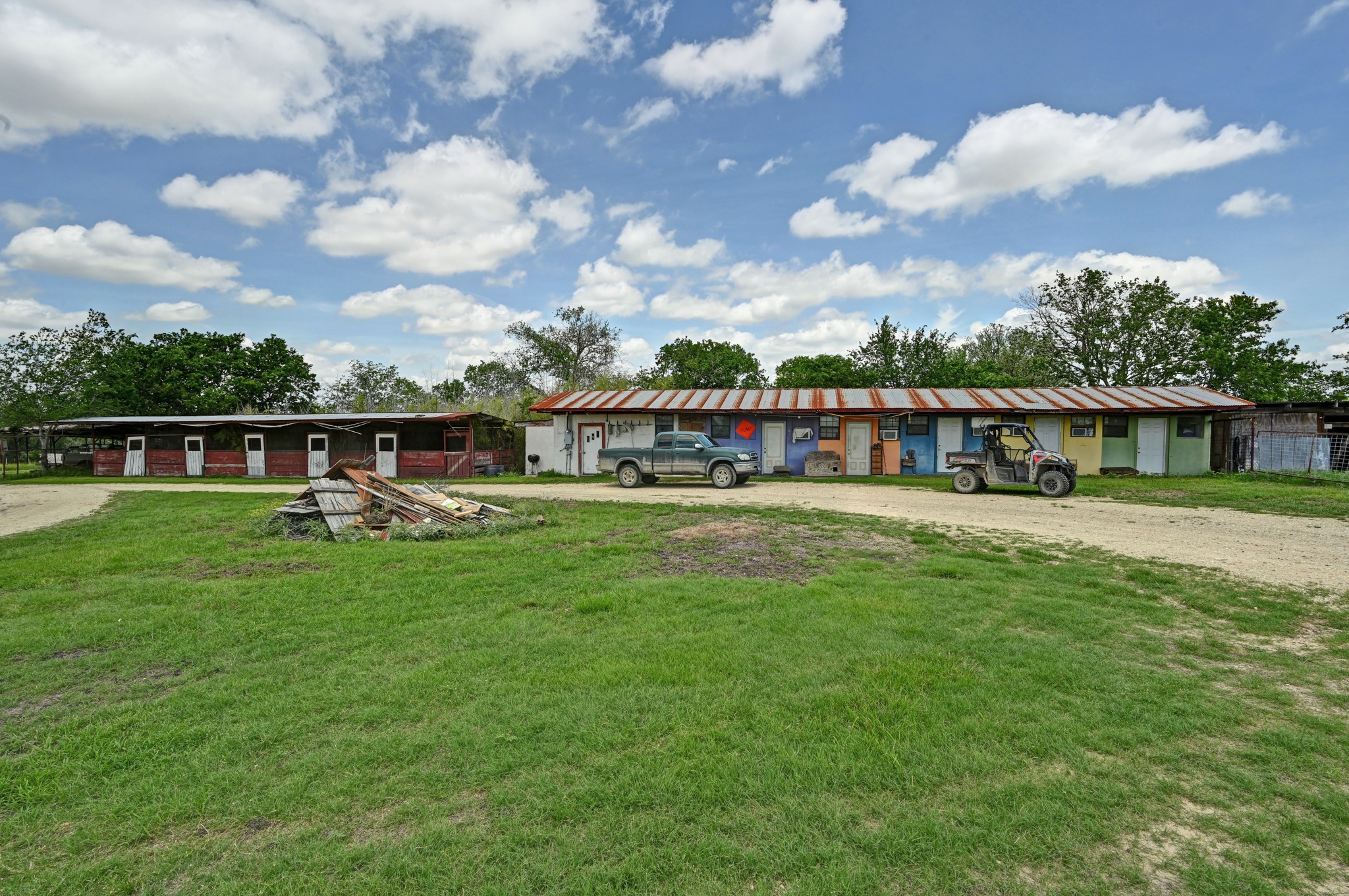 410 Simmons Family Farm Road Lockhart, TX 78644 - Photo 32 of 40 a view of a house with a big yard