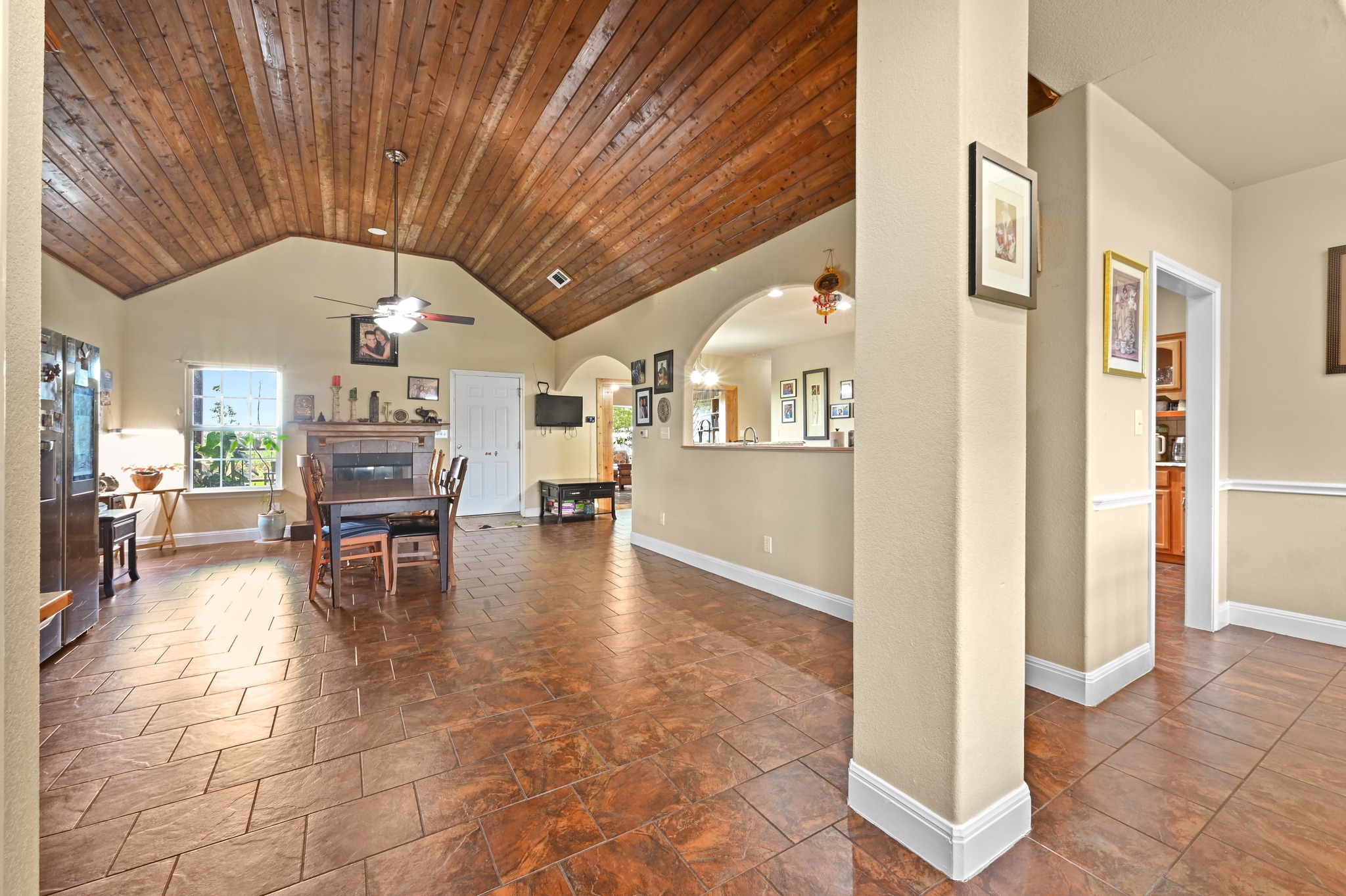 410 Simmons Family Farm Road Lockhart, TX 78644 - Photo 7 of 40 a view of a livingroom with furniture and a kitchen area