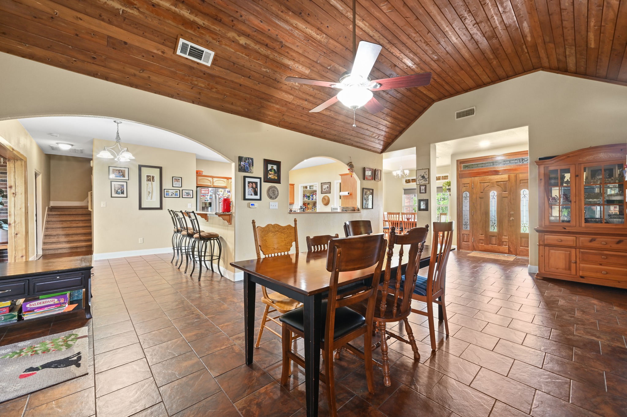 410 Simmons Family Farm Road Lockhart, TX 78644 - Photo 10 of 40 a dining room with furniture and wooden floor