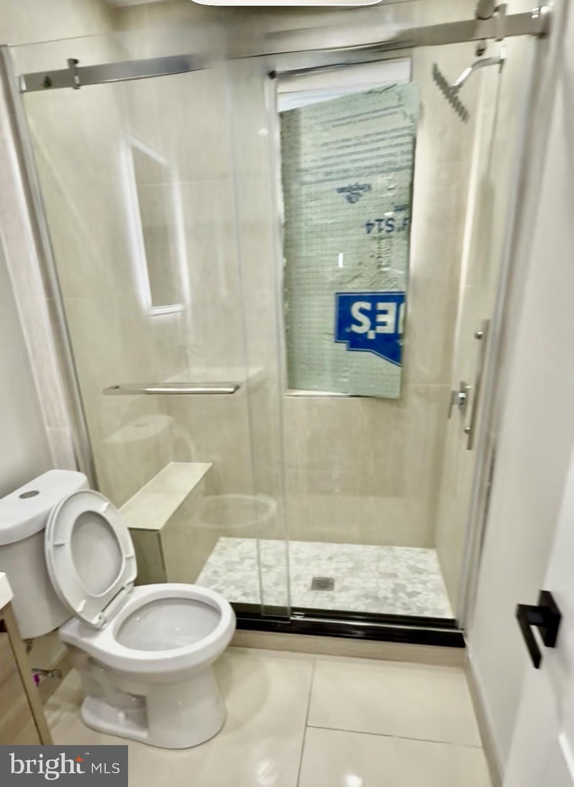 42 Conshohocken State Road, Unit 8A Bala Cynwyd, PA 19004 - Photo 10 of 15 a bathroom with a toilet and a shower