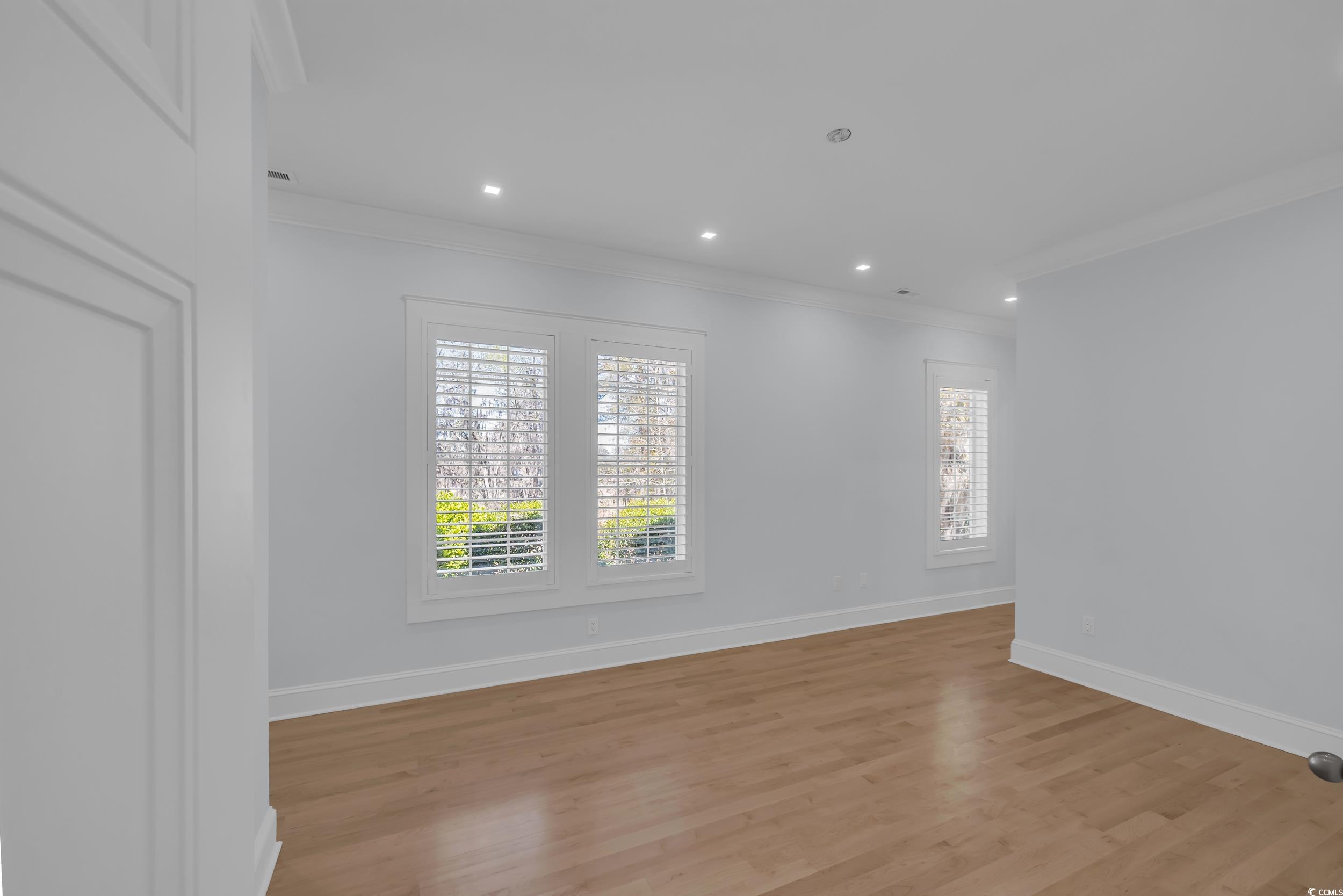 511 Rice Bluff Road Pawleys Island, SC 29585 - Photo 15 of 40 Downstairs bedroom with walk-in closet