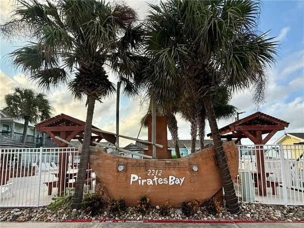 a view of a street with a tree