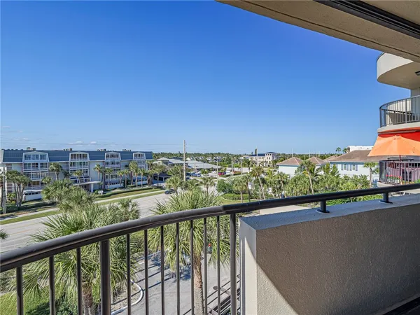 a view of a city skyline from a balcony
