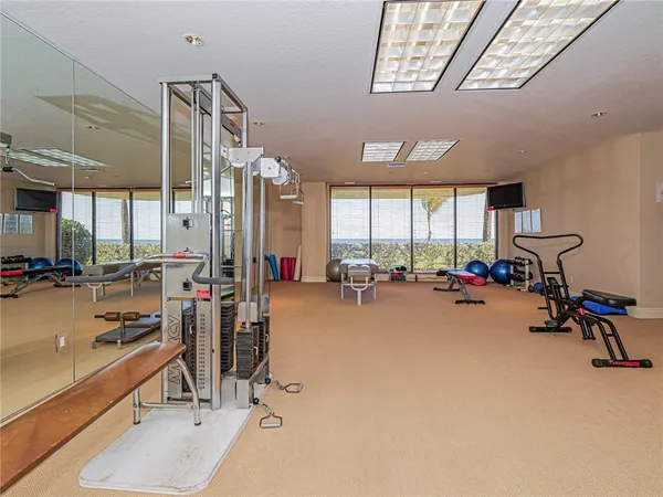 a view of a room with gym equipment