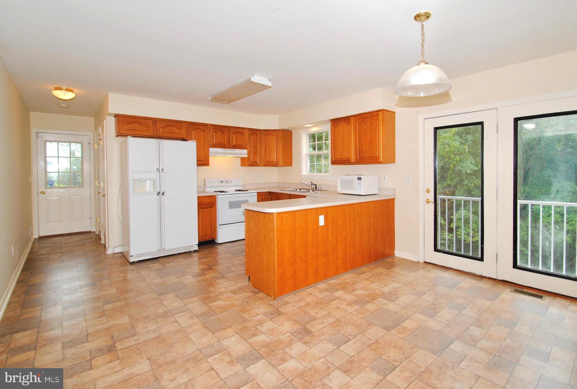 71 Jones Station Road Arnold, MD 21012 - Photo 11 of 26 Open Dining Area Adjoining Kitchen