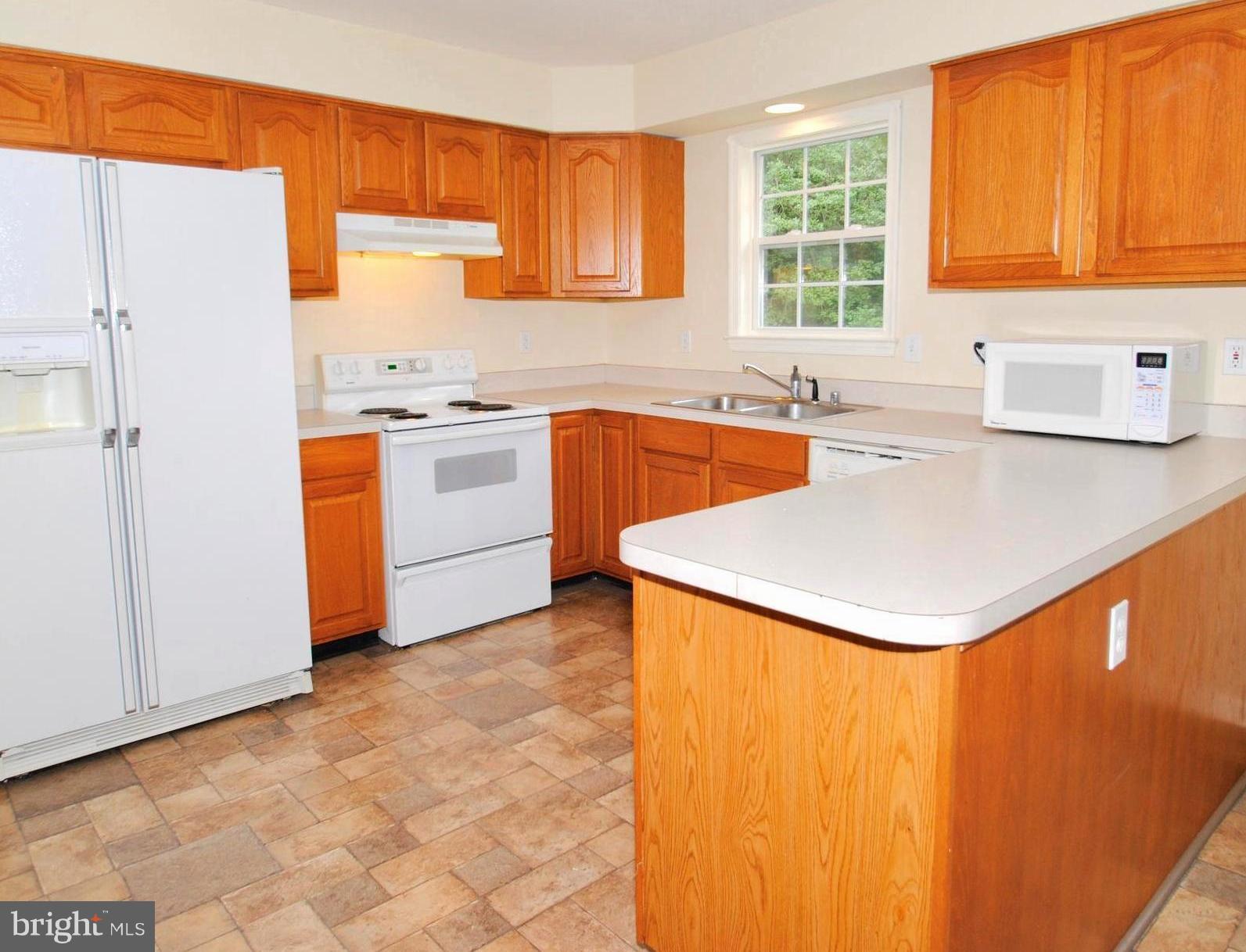 71 Jones Station Road Arnold, MD 21012 - Photo 14 of 26 Kitchen with Easy-Care Flooring . Extended Counter