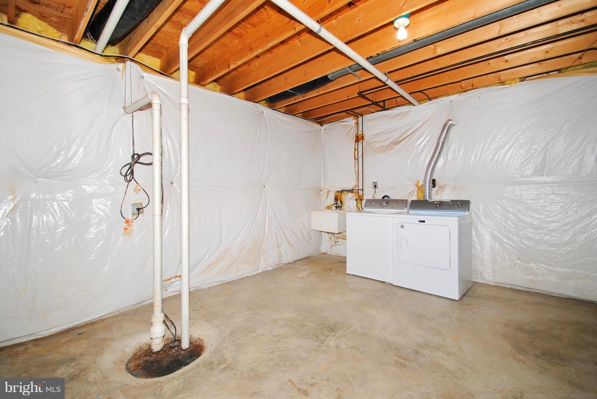 71 Jones Station Road Arnold, MD 21012 - Photo 23 of 26 Bath Rough-In . Laundry Area with Utility Sink