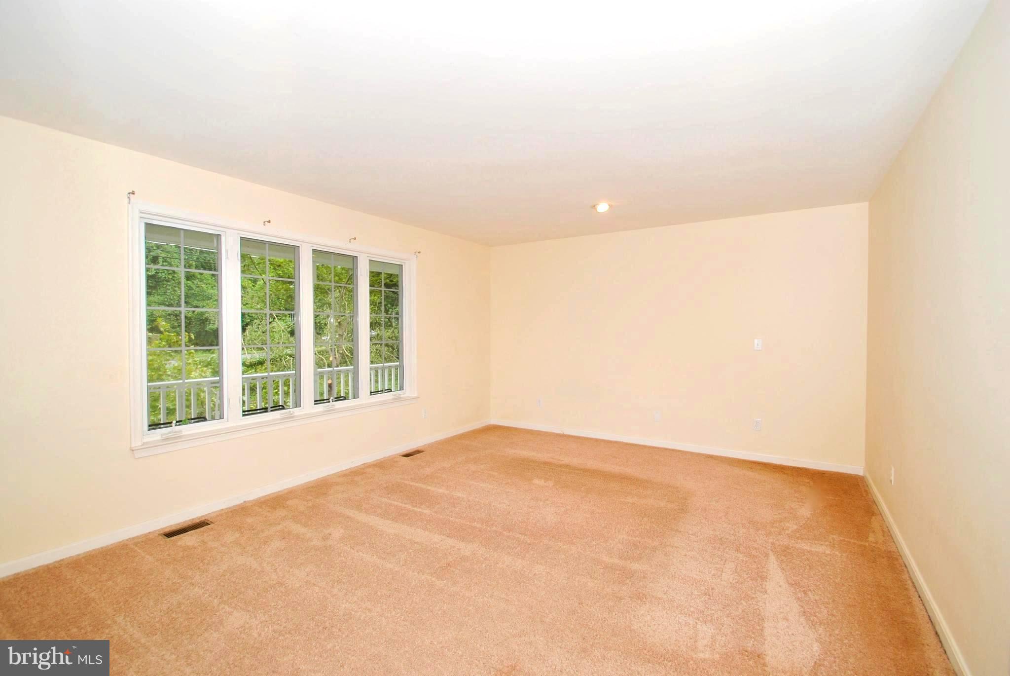 71 Jones Station Road Arnold, MD 21012 - Photo 9 of 26 Light-Filled Picture Window Living Room