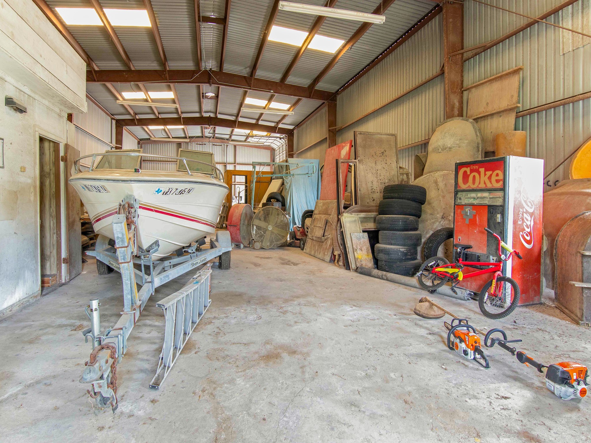 3149 Harkey Road Pearland, TX 77584 - Photo 9 of 14 a view of storage and utility room