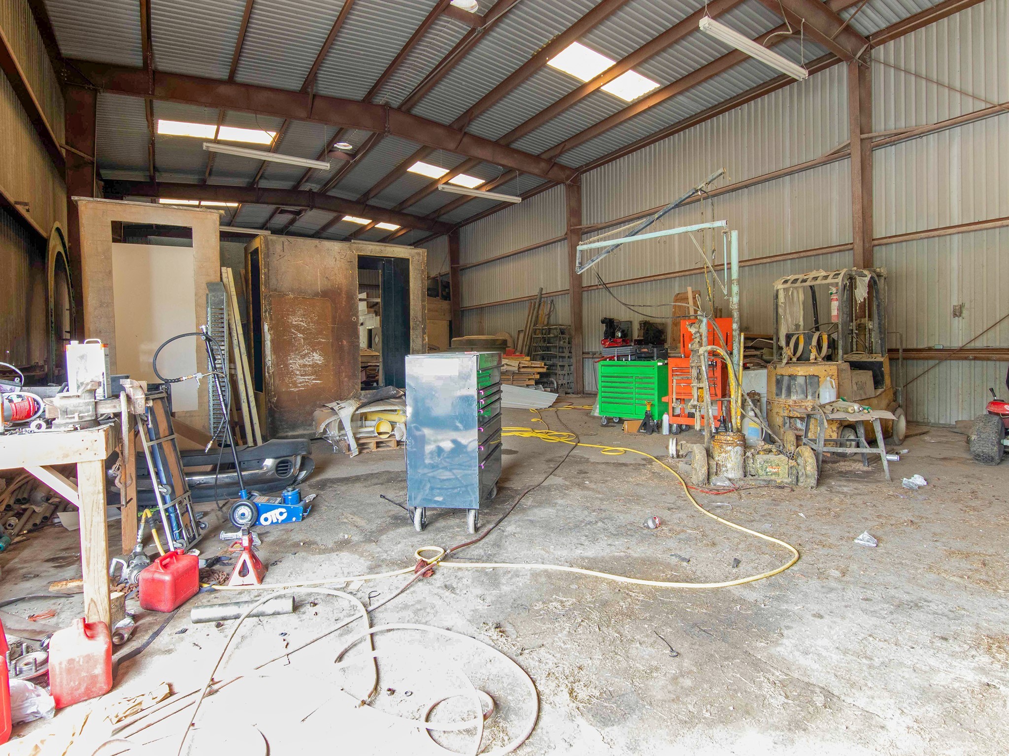 3149 Harkey Road Pearland, TX 77584 - Photo 10 of 14 a view of a garage with rack