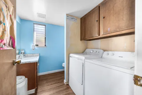 a utility room with dryer and washer