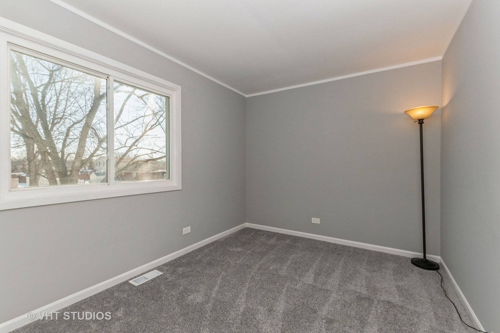 130 Oriole Road Matteson, IL 60443 - Photo 14 of 19 a view of an empty room with a window