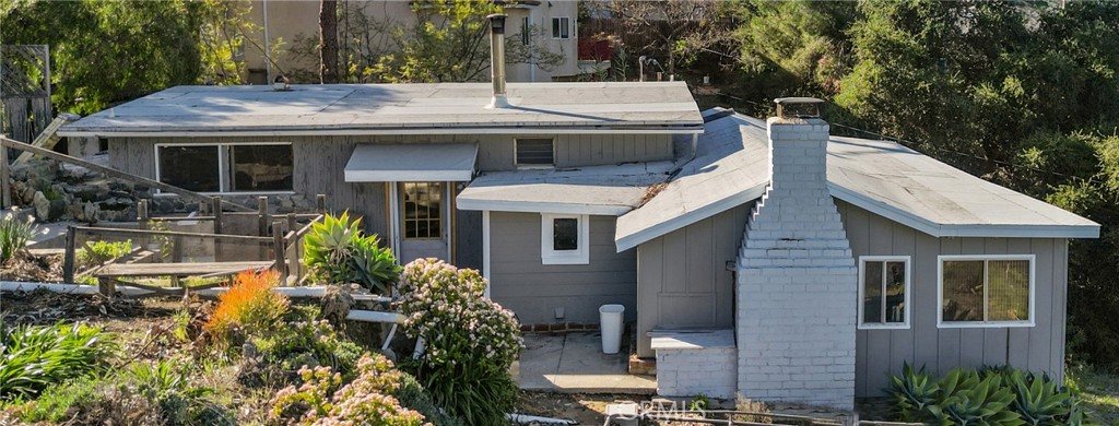 23671 Aster Trail Calabasas, CA 91302 - Photo 10 of 15 a front view of a house with garden