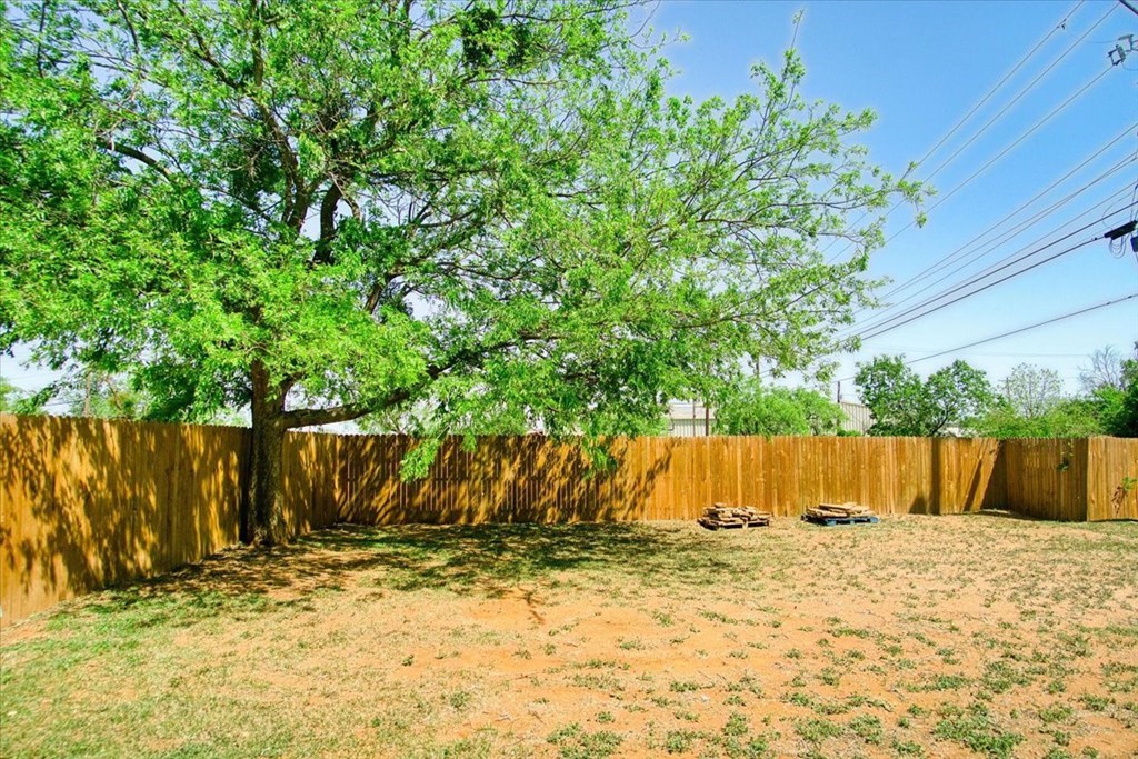 109 North Live Oak Street Mason, TX 76856 - Photo 16 of 22 a view of a backyard