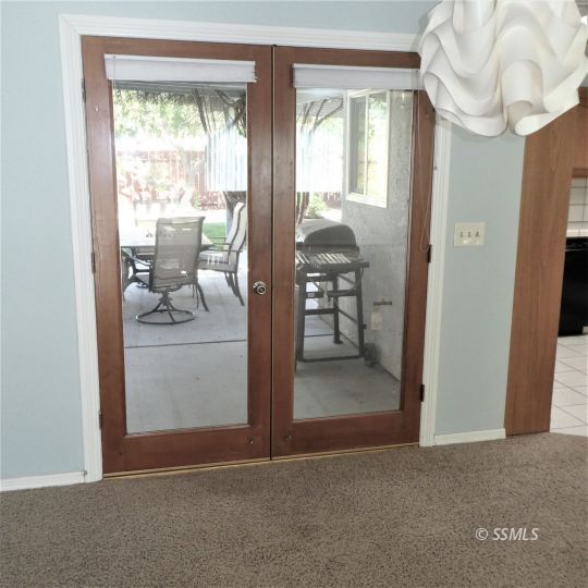 1104 North Inyo Street Ridgecrest, CA 93555 - Photo 13 of 31 a view of living room and window