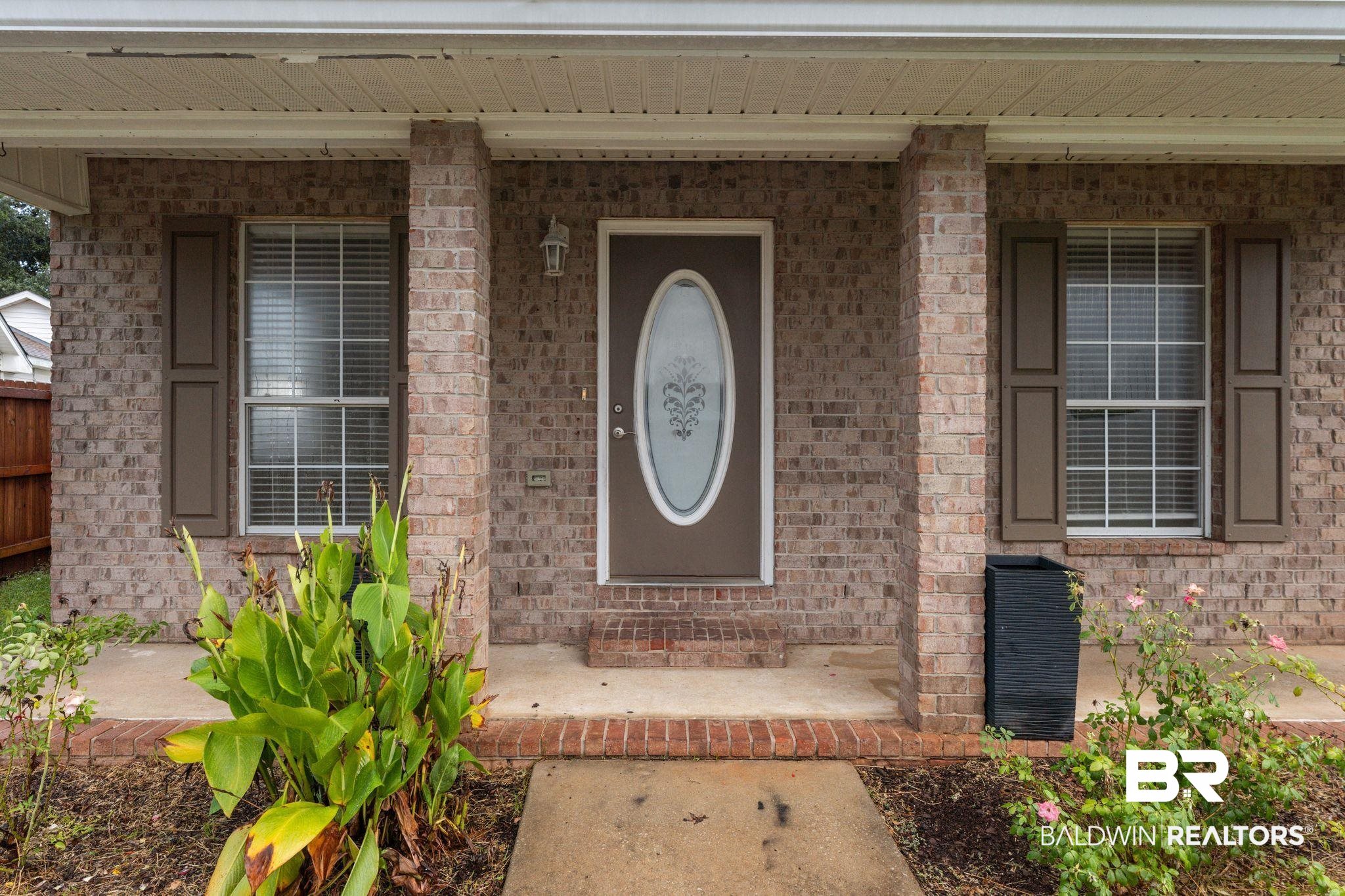 4009 Kendallbrook Loop Foley, AL 36535 - Photo 3 of 28 Property entrance with covered porch and brick siding