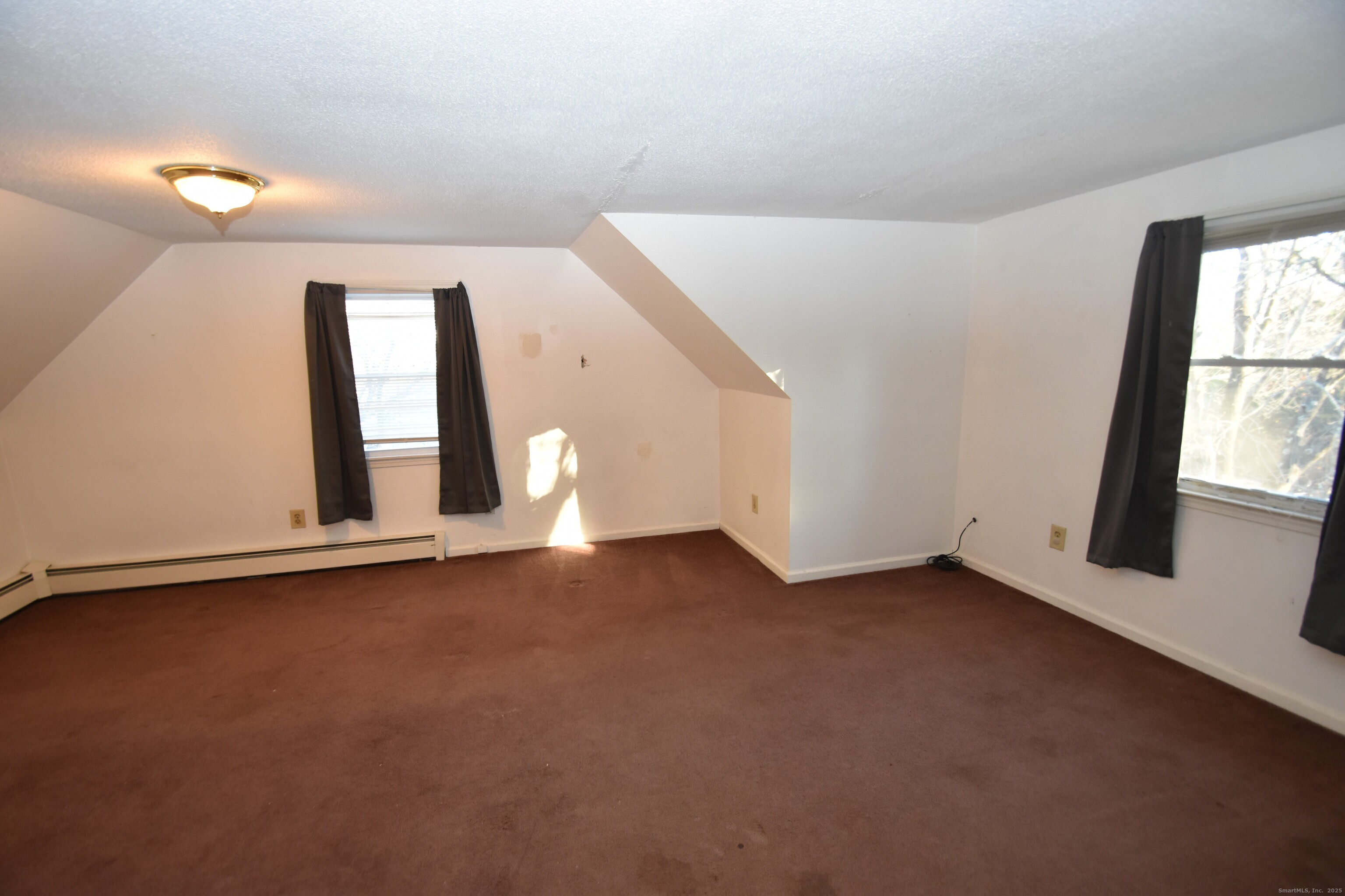 28 Hickory Road Colchester, CT 06415 - Photo 15 of 22 an empty room with windows