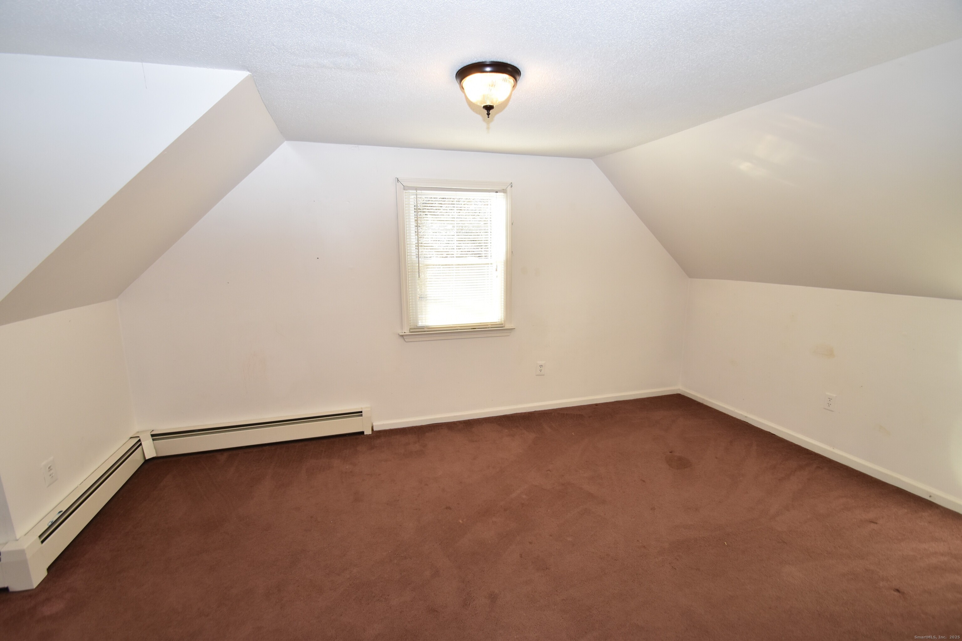 28 Hickory Road Colchester, CT 06415 - Photo 19 of 22 an empty room with a window