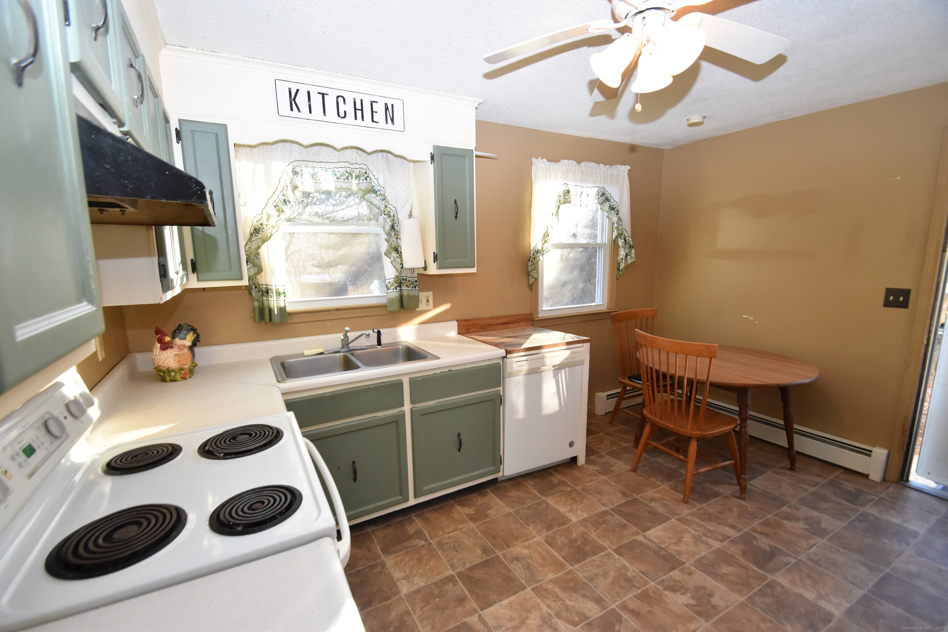 28 Hickory Road Colchester, CT 06415 - Photo 7 of 22 a room with a cabinets and a table