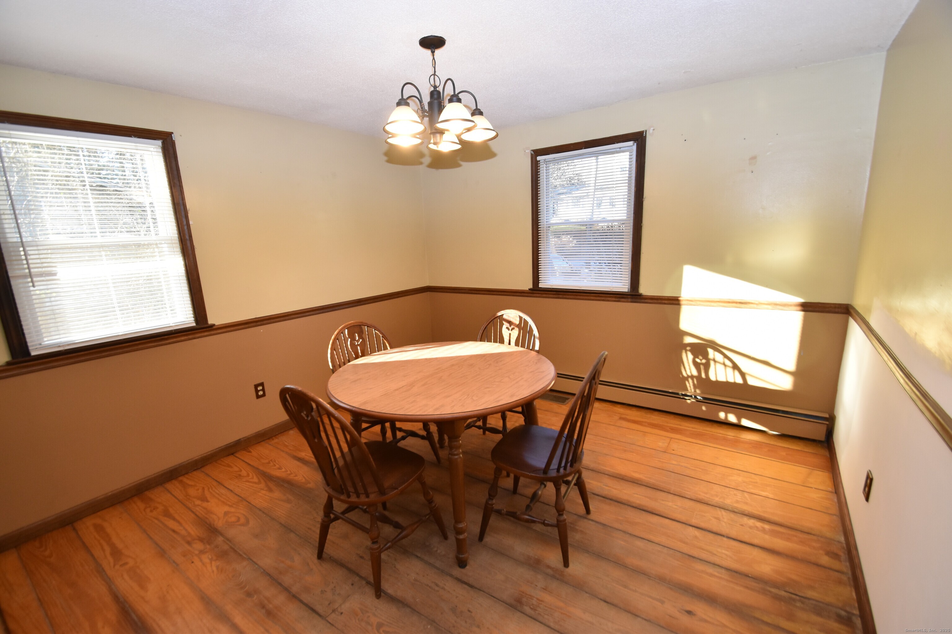 28 Hickory Road Colchester, CT 06415 - Photo 9 of 22 a view of a dining room with furniture and window