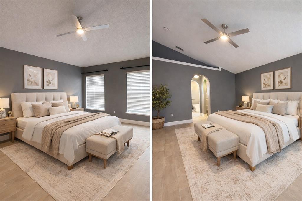 6172 Raleigh Street Spring Hill, FL 34606 - Photo 47 of 64 a bedroom with a large bed and a chandelier