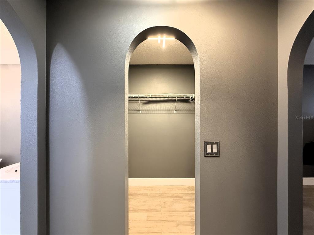 6172 Raleigh Street Spring Hill, FL 34606 - Photo 50 of 64 a view of empty room with wooden floor and fan