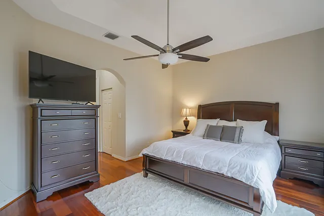 a en suite bathroom with double vanity sinks and a mirror