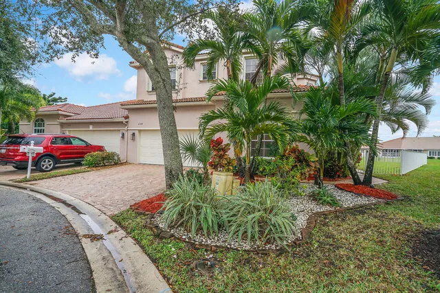 a view of a garden with a bench