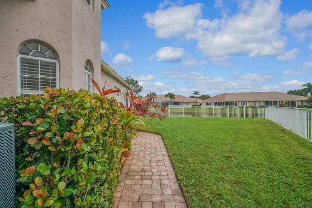 a room with a sink vanity and mirror