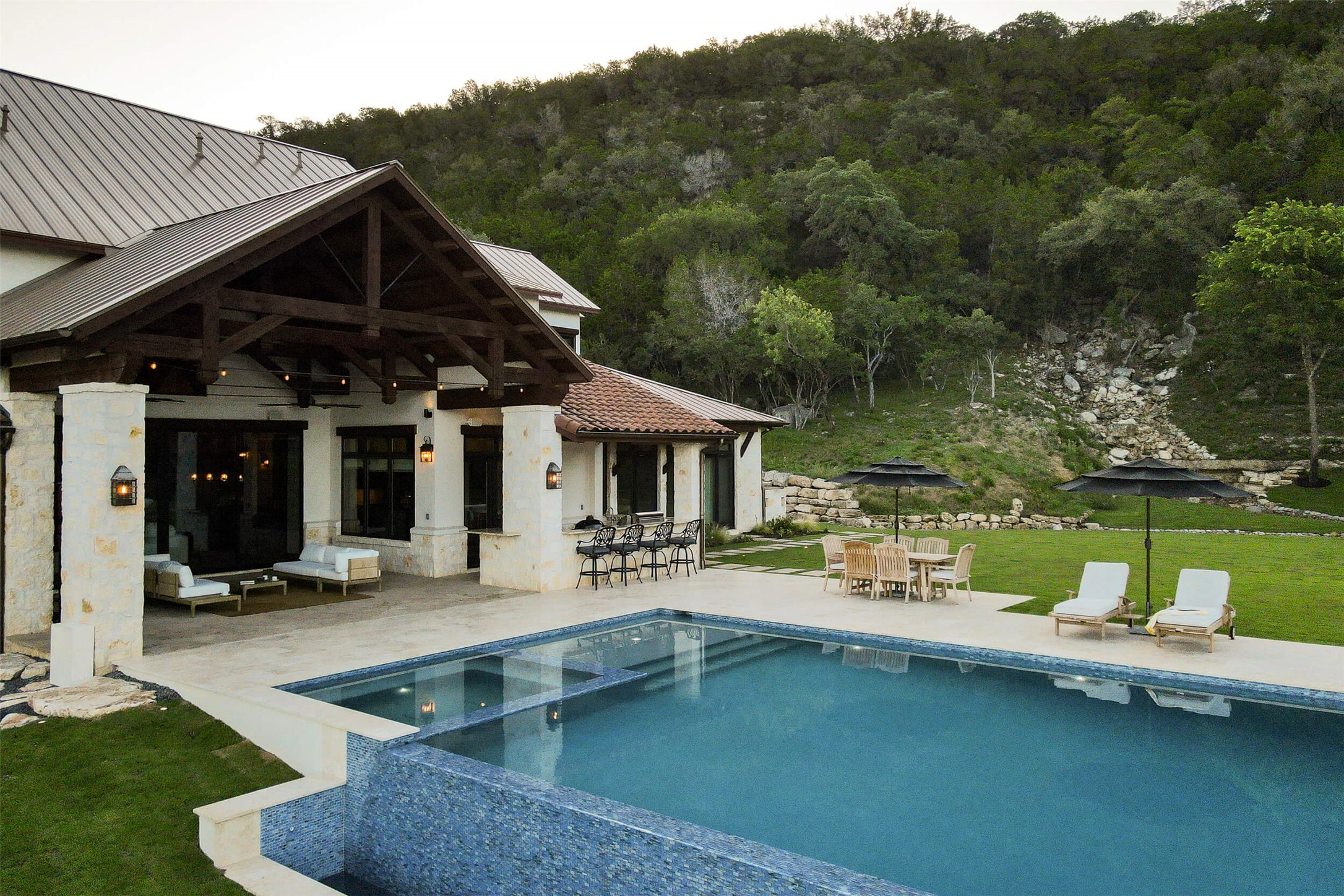 15016 Flat Top Ranch Road Austin, TX 78732 - Photo 11 of 40 a view of a house with pool