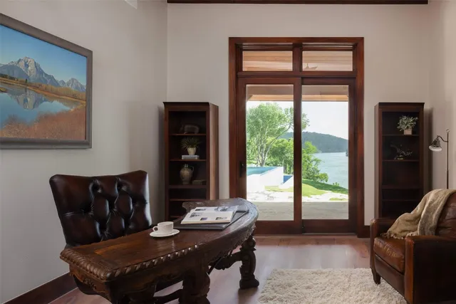 a view of a livingroom with furniture and window
