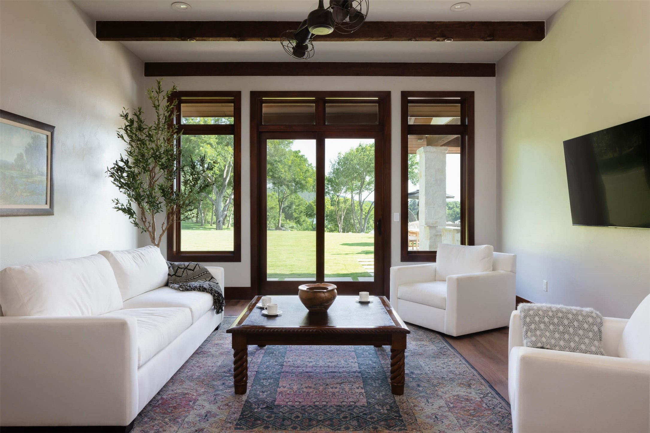 15016 Flat Top Ranch Road Austin, TX 78732 - Photo 31 of 40 a living room with furniture and a large window