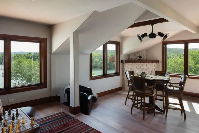 a view of a dining room with furniture window and outside view