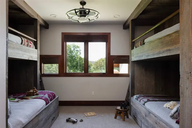 a room with furniture and a flat screen tv