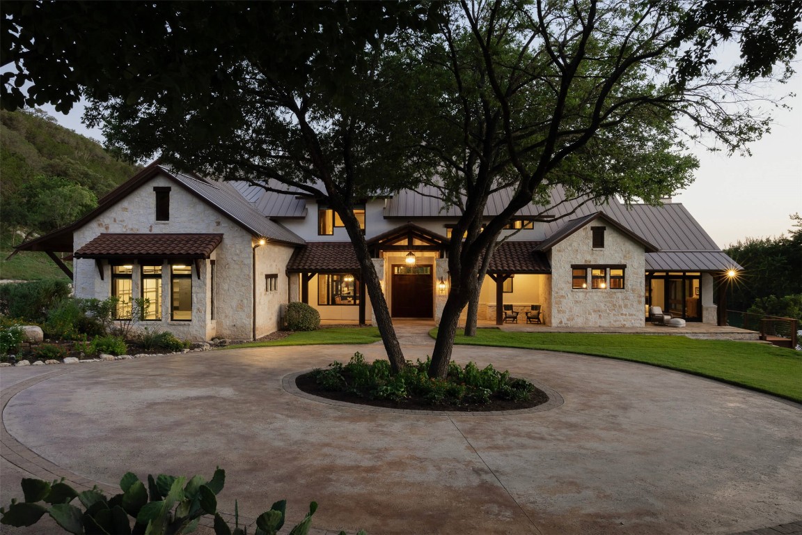 15016 Flat Top Ranch Road Austin, TX 78732 - Photo 39 of 40 a front view of a house with garden