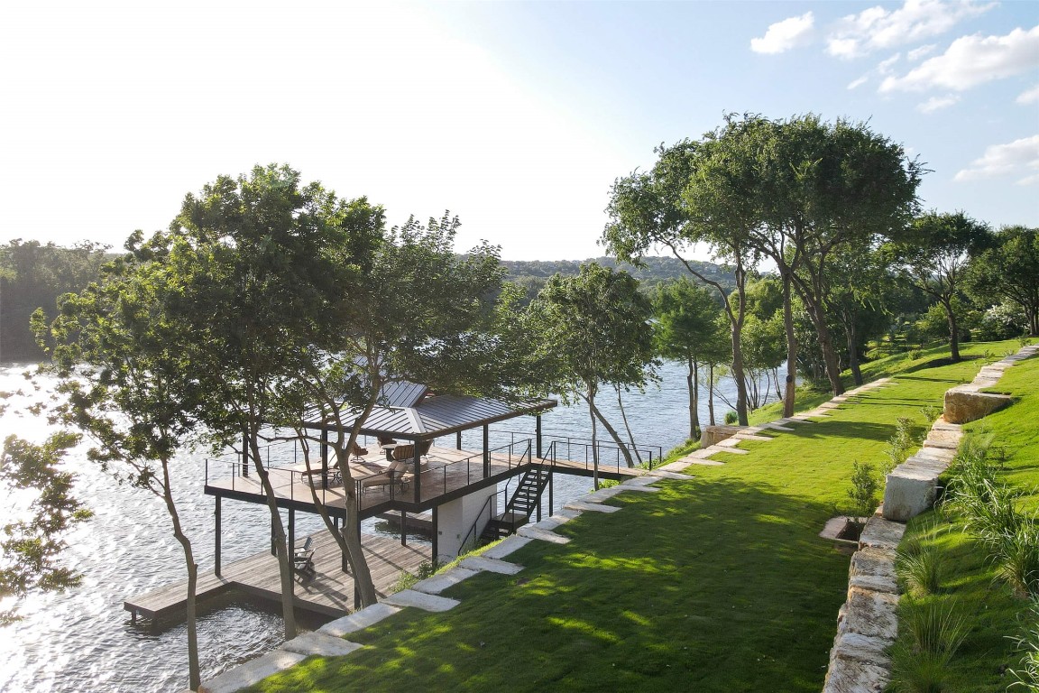 15016 Flat Top Ranch Road Austin, TX 78732 - Photo 10 of 40 a view of yard with swimming pool and sitting area