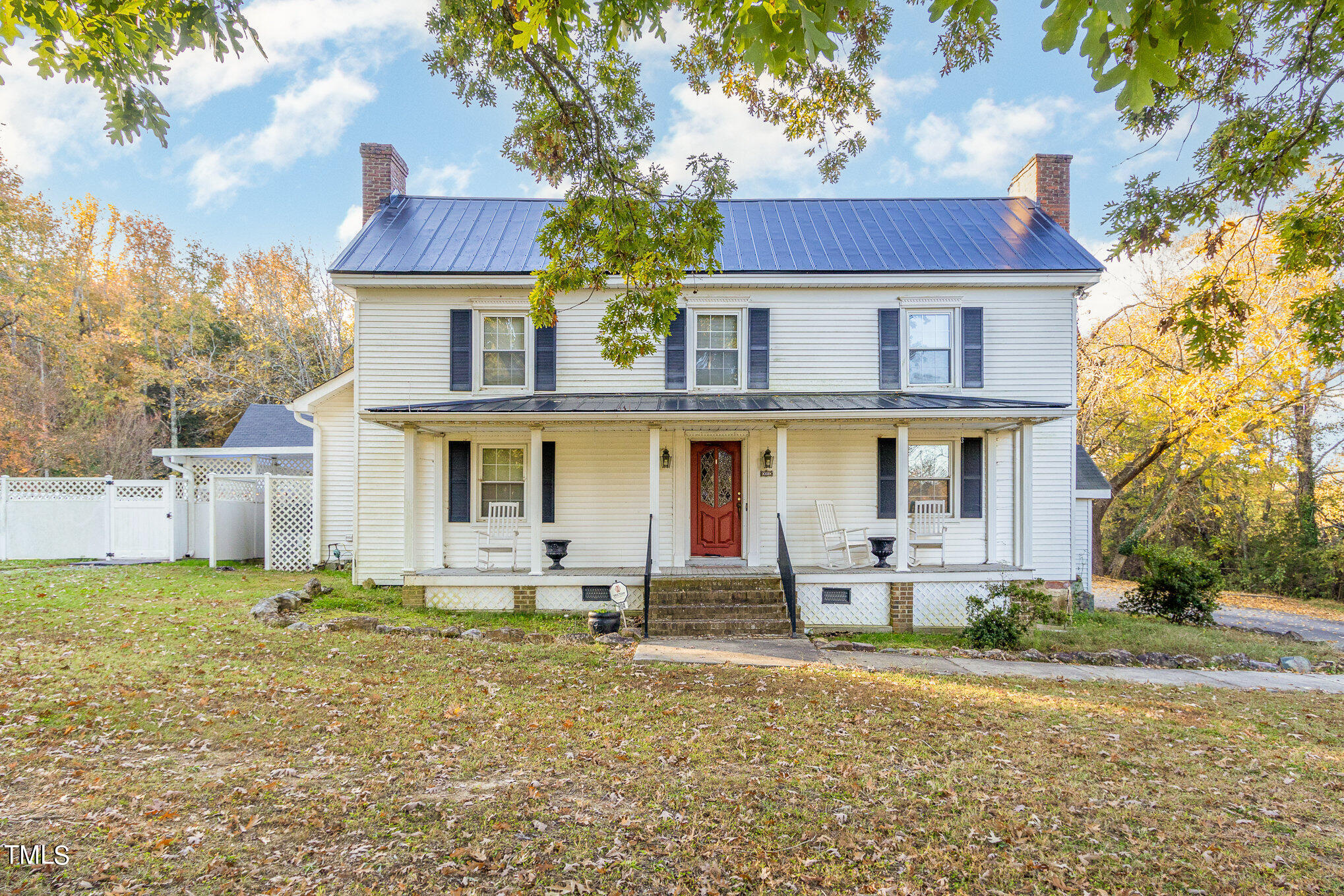 804 Bahama Road Bahama, NC 27503 - Photo 1 of 80 a front view of a house with garden