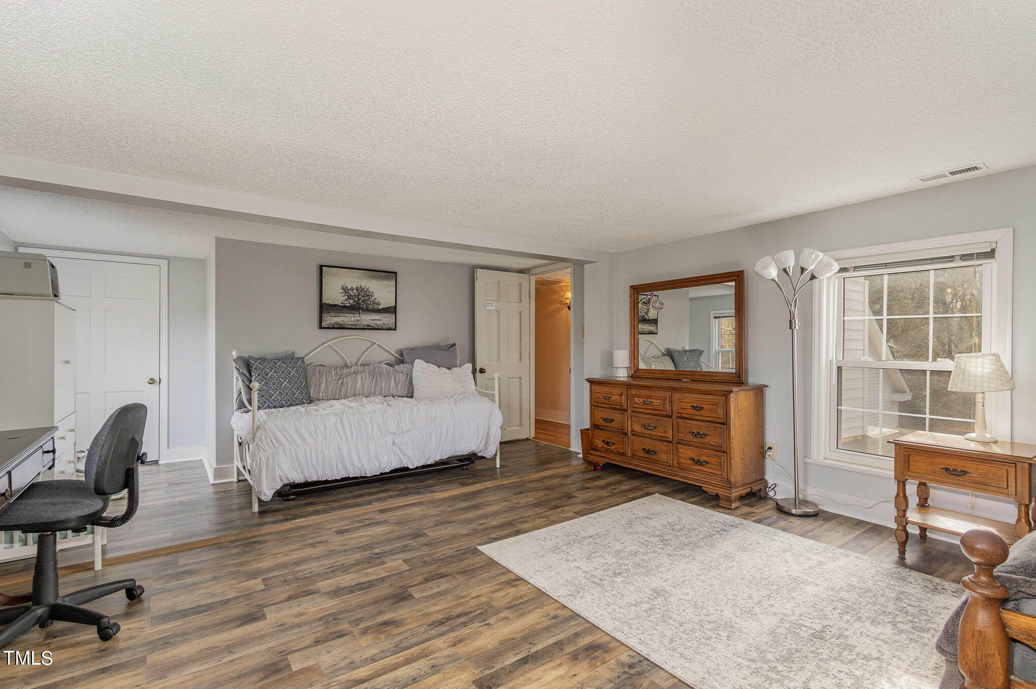 804 Bahama Road Bahama, NC 27503 - Photo 30 of 80 a bedroom with furniture and a window