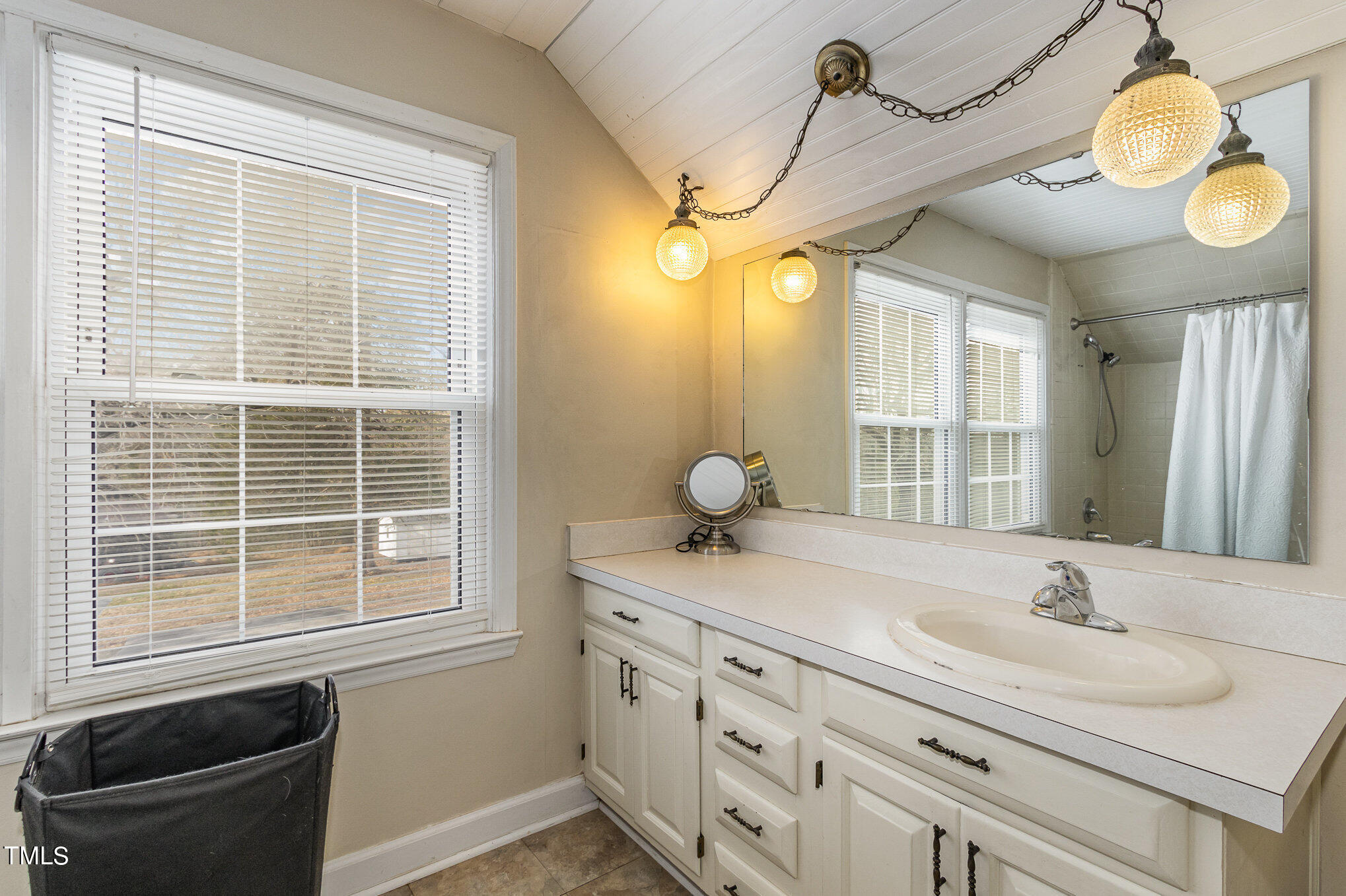 804 Bahama Road Bahama, NC 27503 - Photo 37 of 80 a bathroom with a granite countertop sink and a mirror