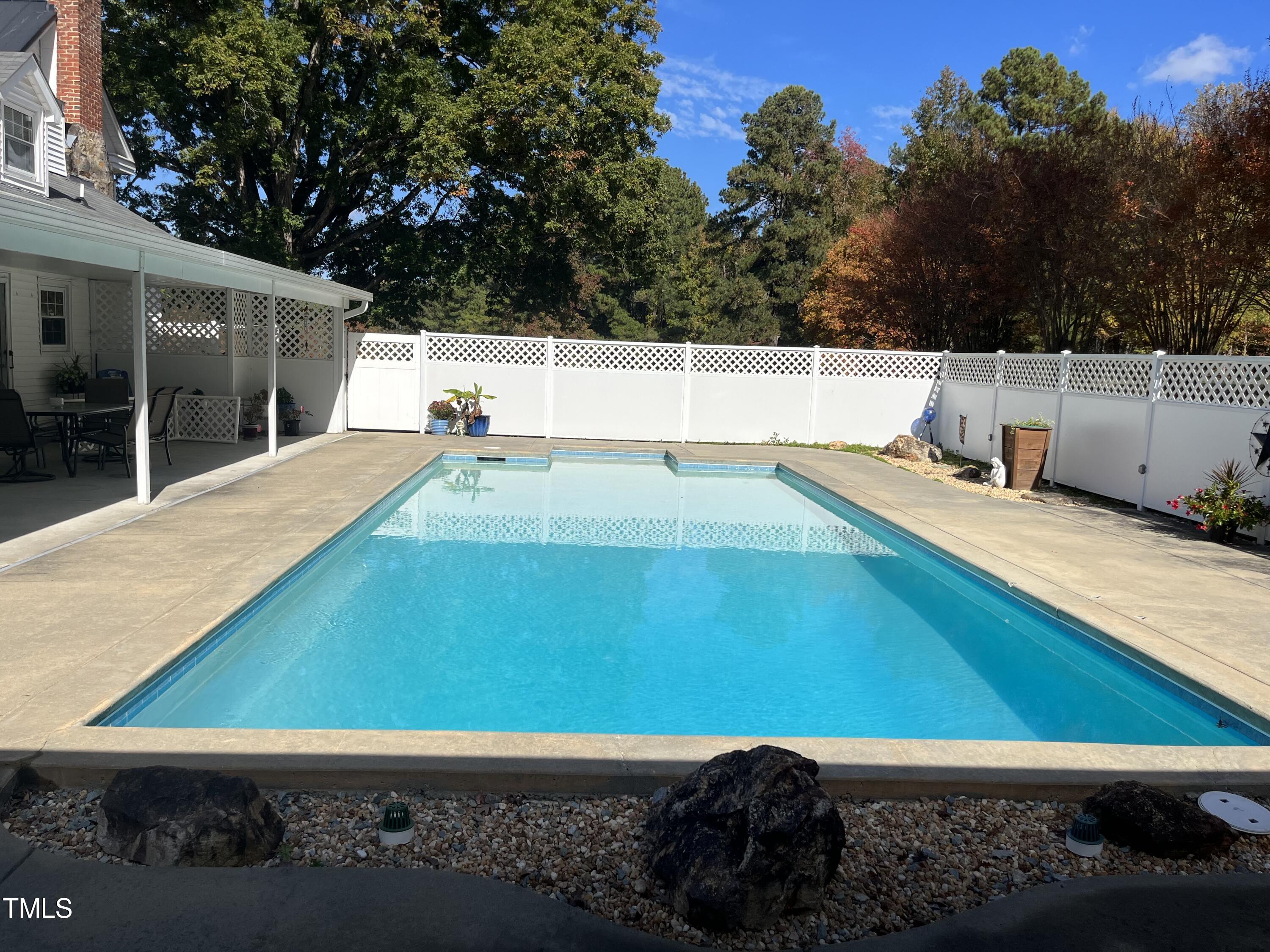 804 Bahama Road Bahama, NC 27503 - Photo 56 of 80 a view of a pool with a yard